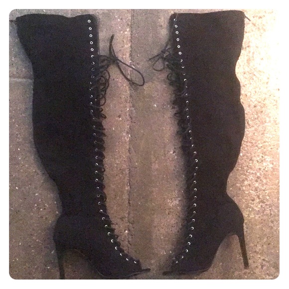 Shoes - Black thigh high stilettos.